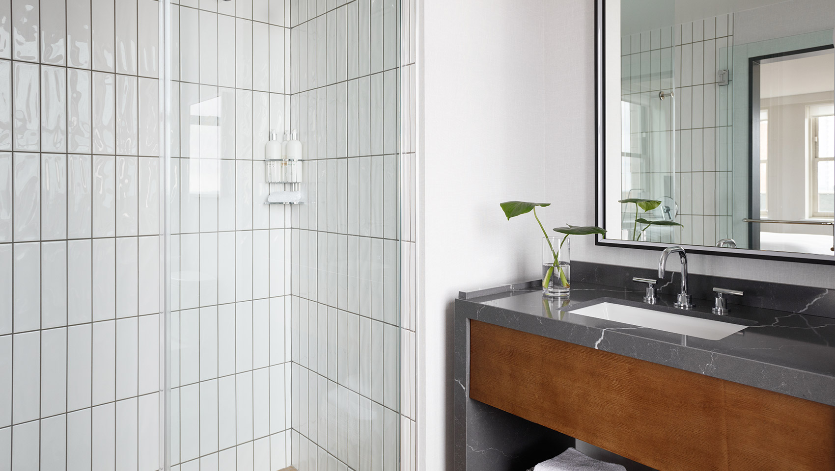 Guest room bathroom featuring walk-in shower