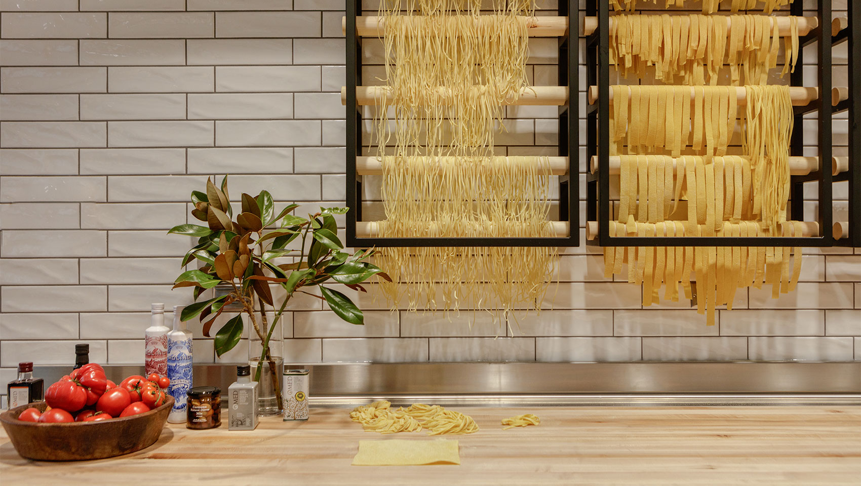 Fresh made pasta in restaurant glass pasta room